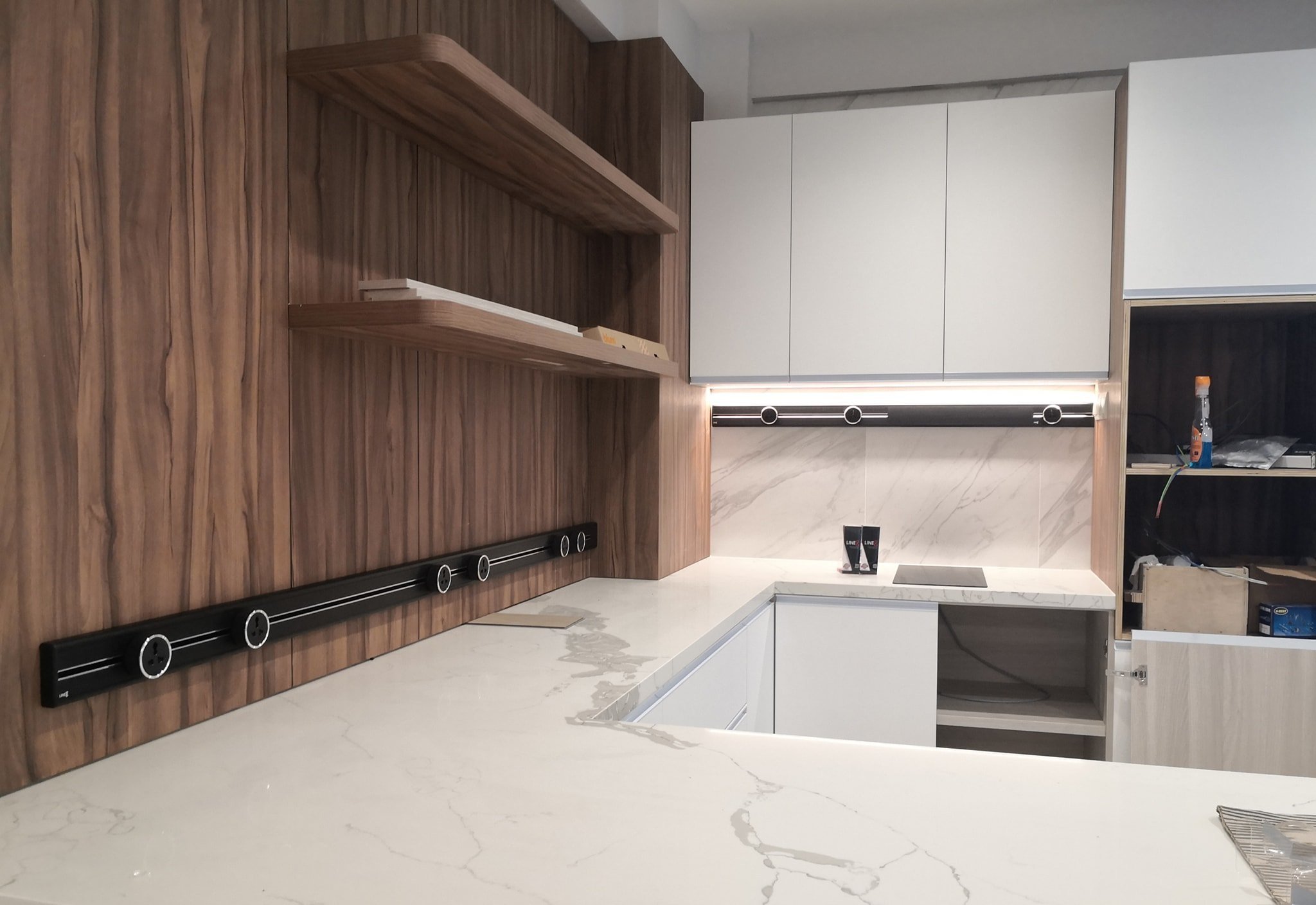 Line8 power track seamlessly integrated into a modern kitchen