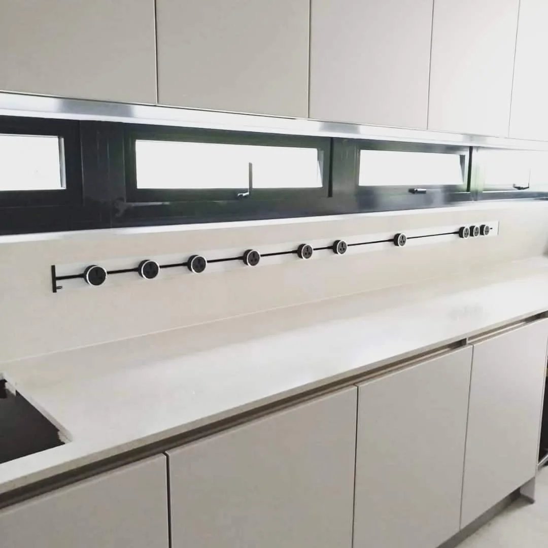 Line8 Model SL track in Black Hairline above the kitchen countertop powering lighting modules
