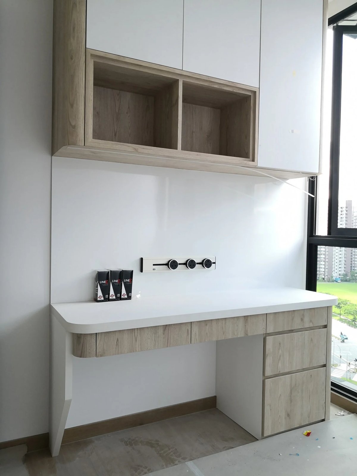 Line8 Model SL track in American Spruce above a study desk