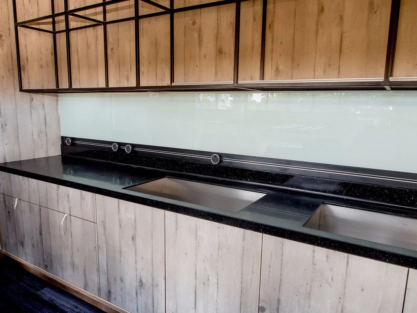 Line8 Model SL track in Black Hairline above the kitchen sink area