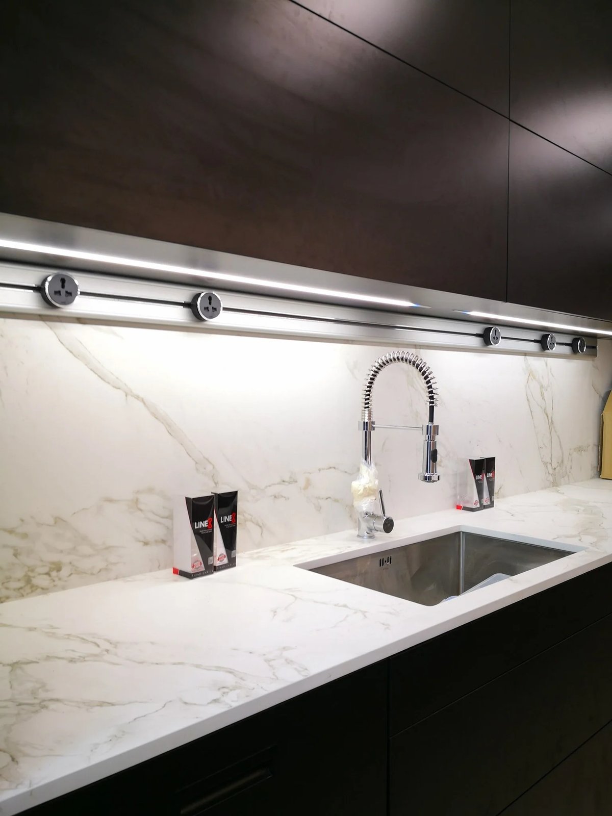 Line8 Model SL track in Silver Hairline above a kitchen sink