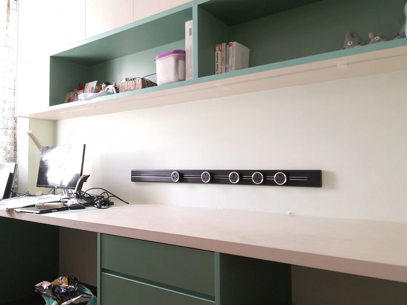 Line8 Model SL track in Black Hairline above a study desk powering task lighting