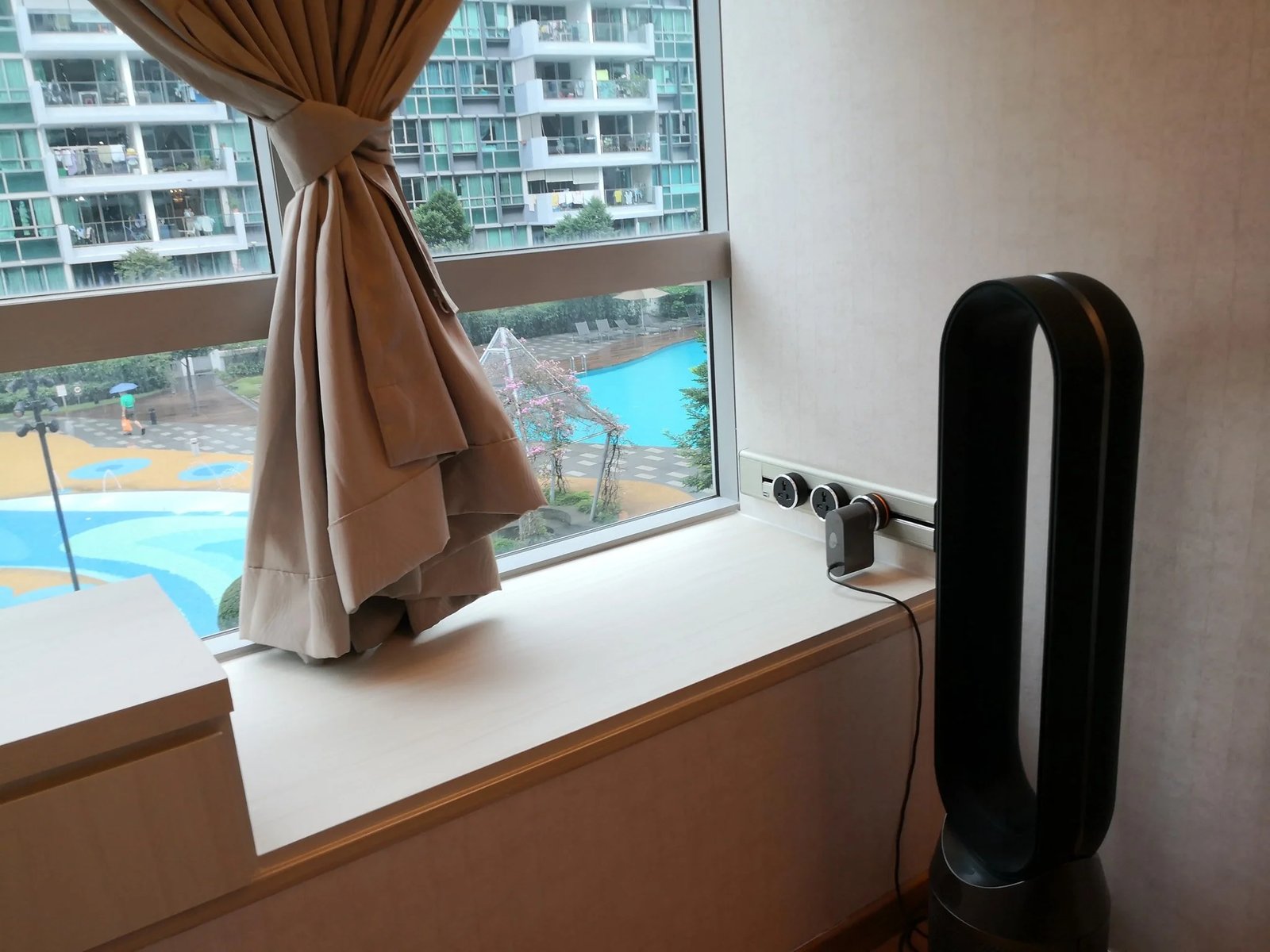 Line8 Model SL track in Black Hairline above a study desk powering a fan