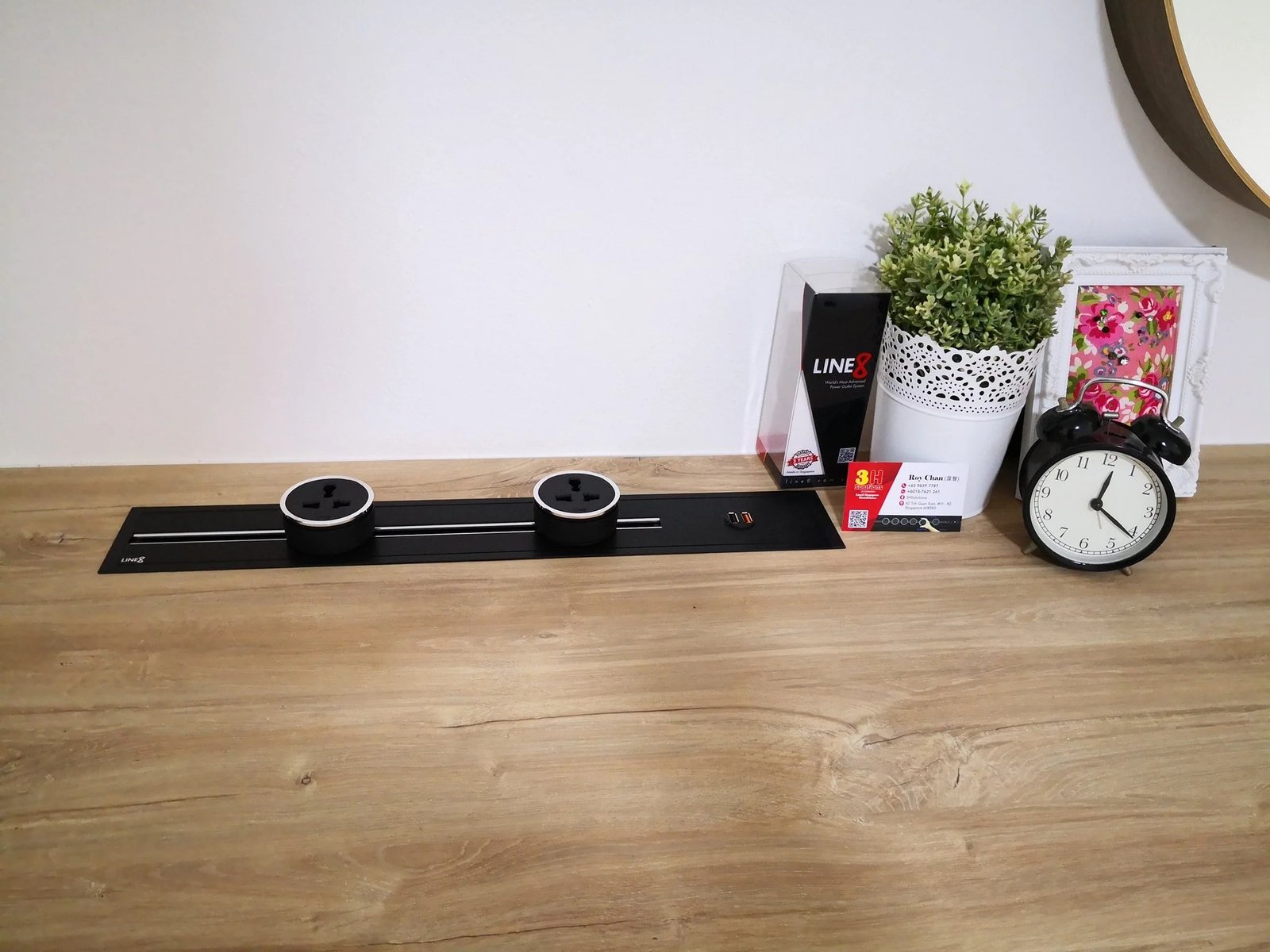Line8 Model SL track in Black Hairline on a study desk powering devices and decor