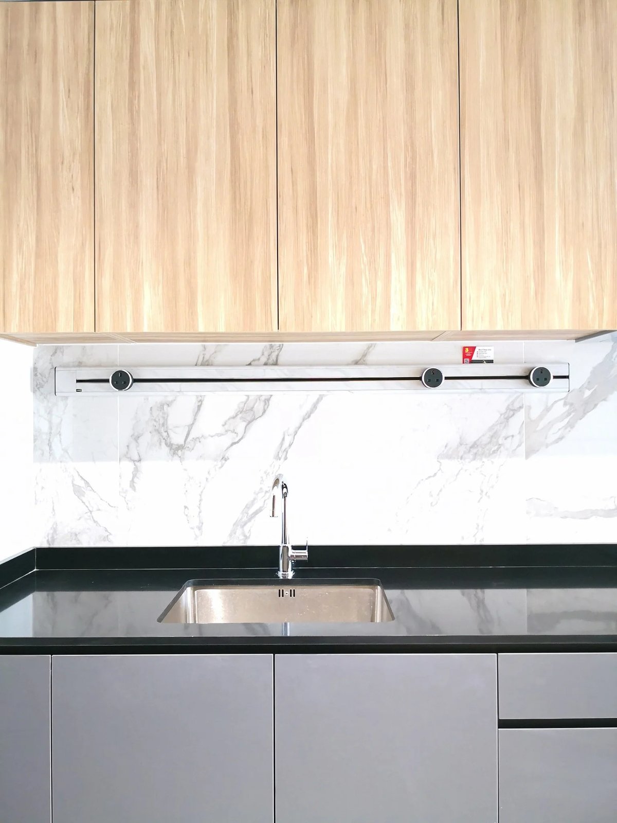 Line8 Model SL track in Silver Hairline above a kitchen sink