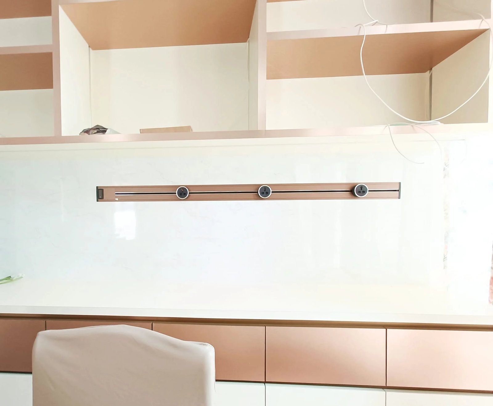 Line8 Model SL track in Rose Gold above a kitchen countertop