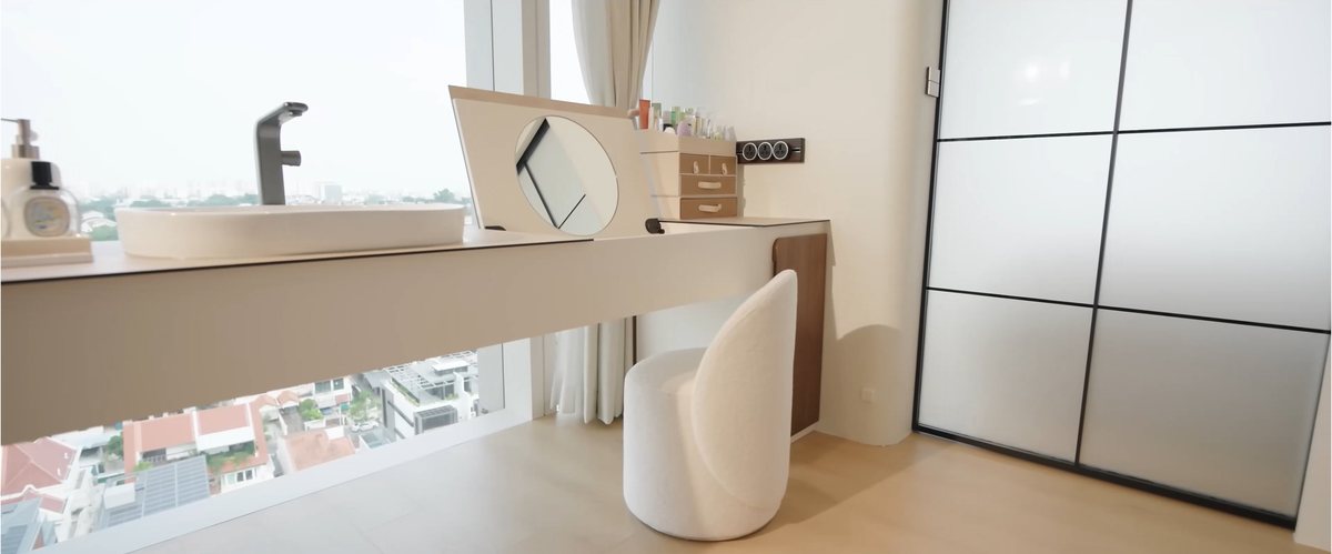 Black Line8 adaptors on a vanity counter track with a high-rise city view