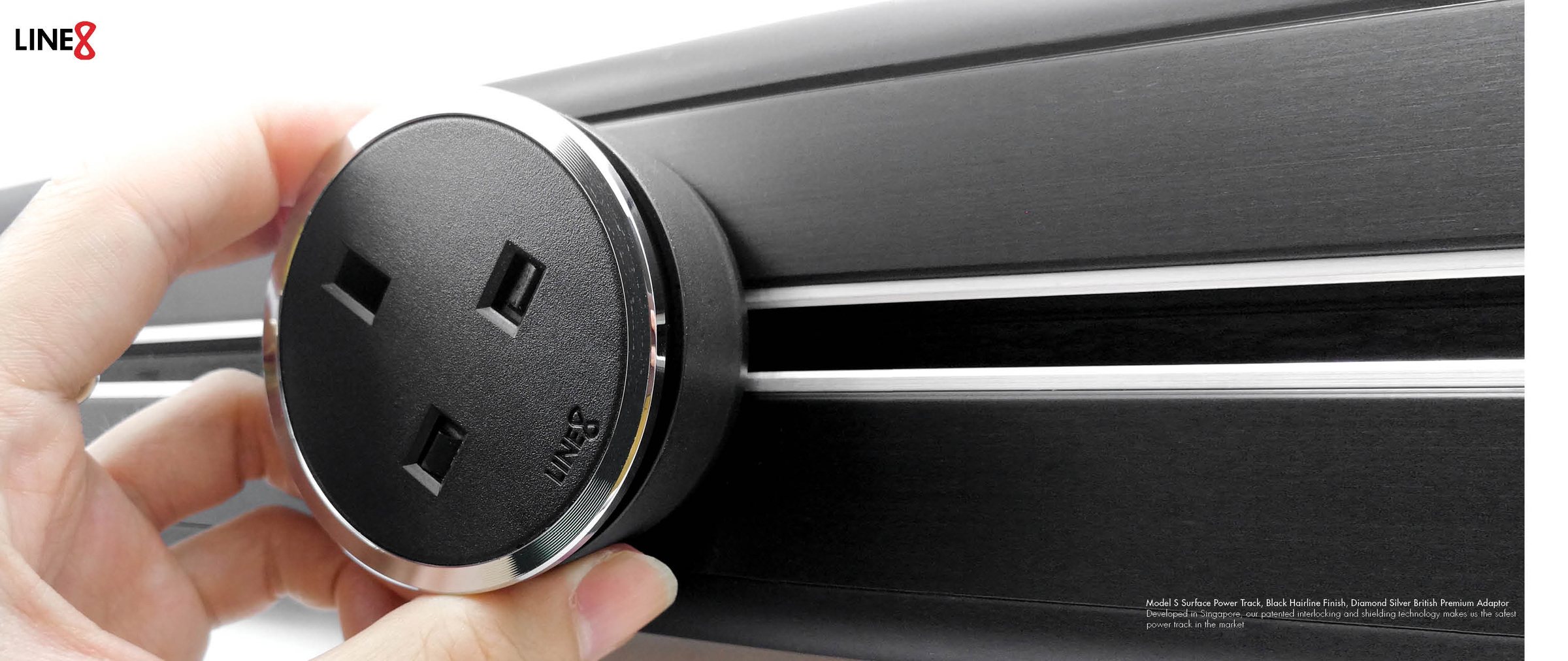 Line8 power track, Black Hairline finish, macro shot of a British premium adaptor