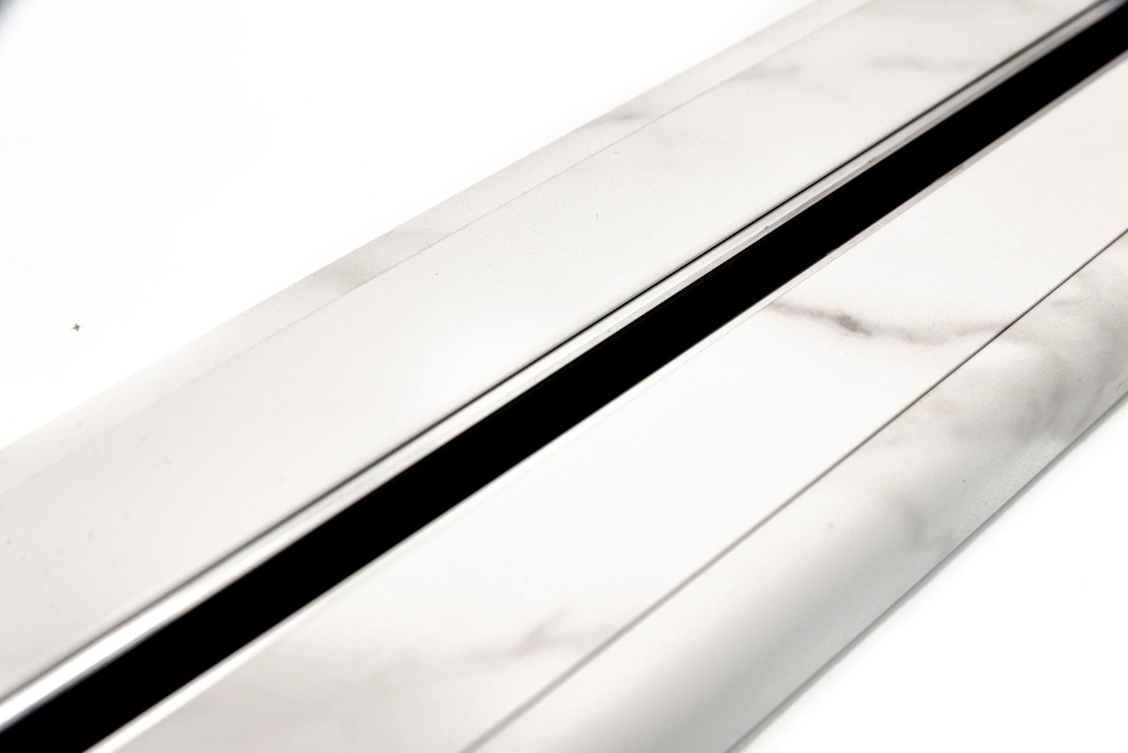 Line8 Model R track in White Marble flush with a wall for lighting