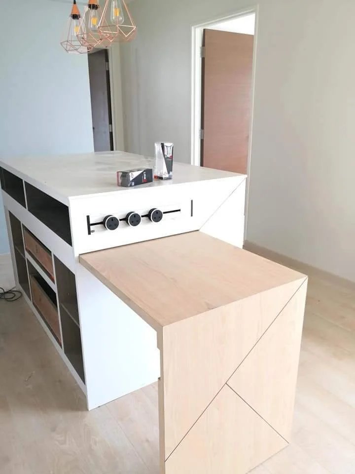 Line8 Model SL track in Black Hairline above a kitchen island with a design