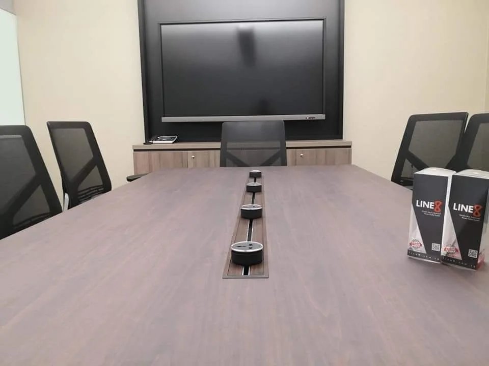 Line8 Model SL track in Black Hairline above a conference table