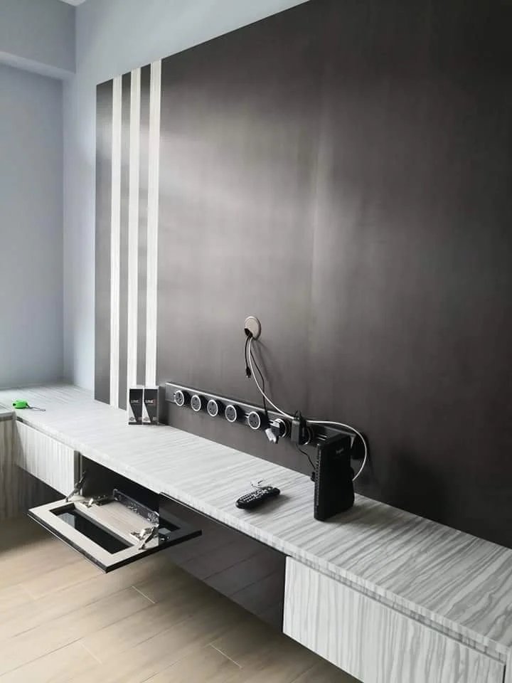 Line8 Model SL track in Black Hairline above a media console