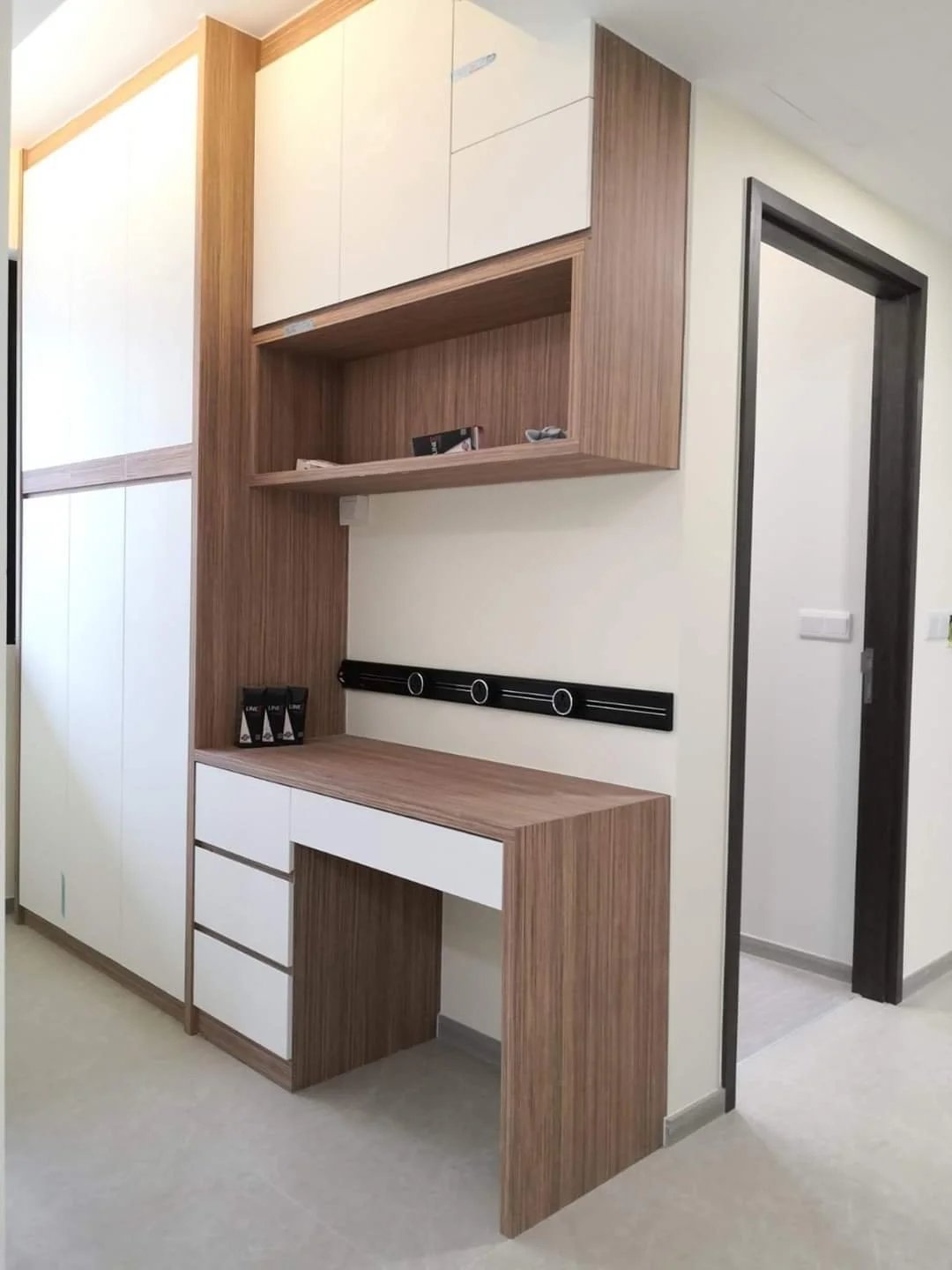 Line8 Model SL track in Black Hairline above a study desk with storage