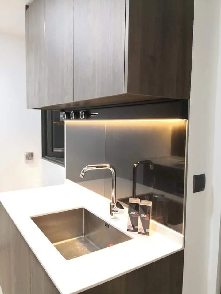 Line8 Model SL track in Black Hairline above the kitchen sink powering under-cabinet lighting
