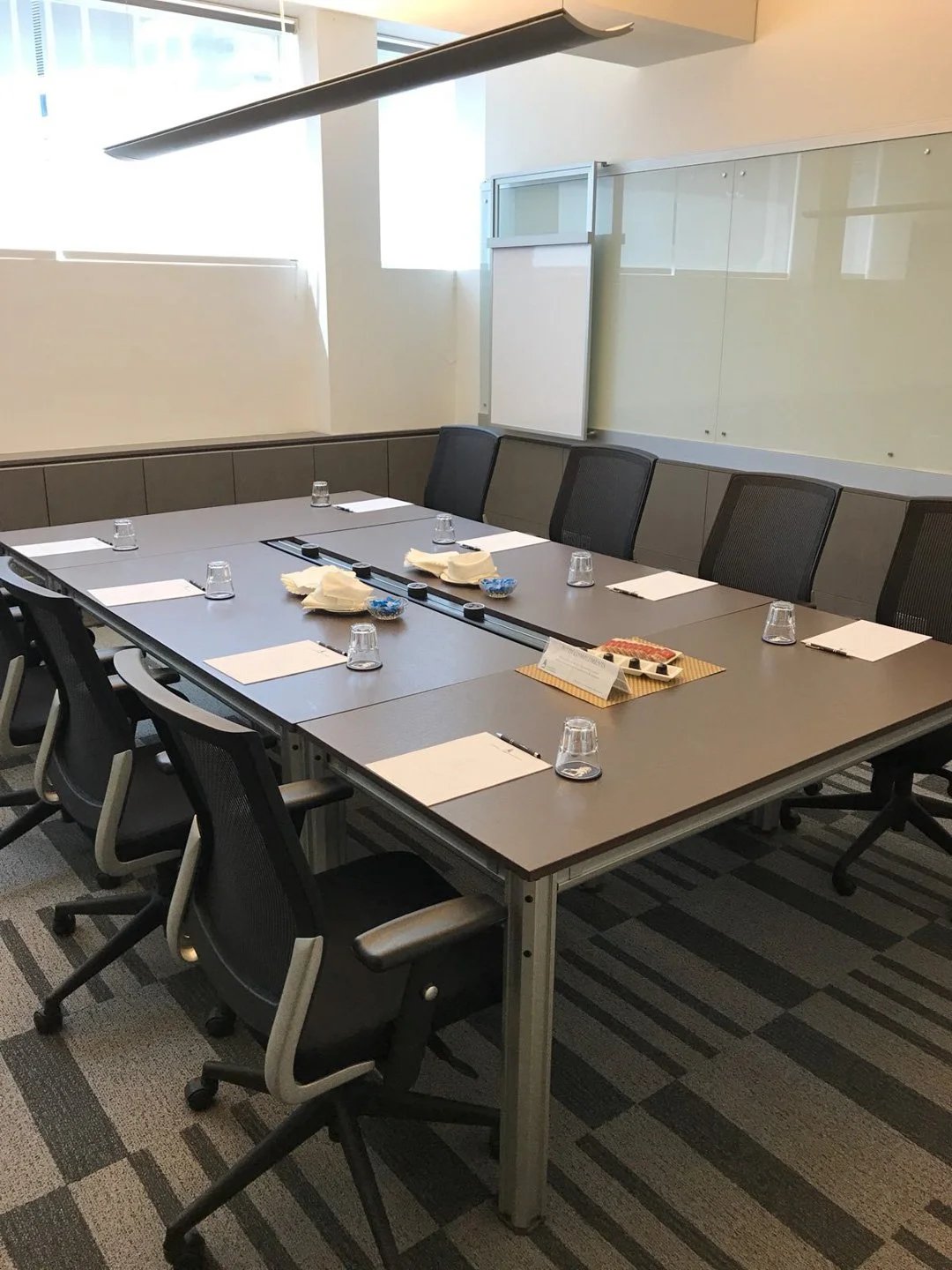 Line8 Model SL track in Black Hairline above a conference table
