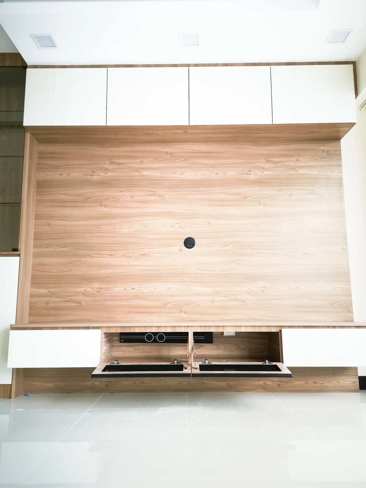Line8 Model SL track in Black Hairline above a wooden media console