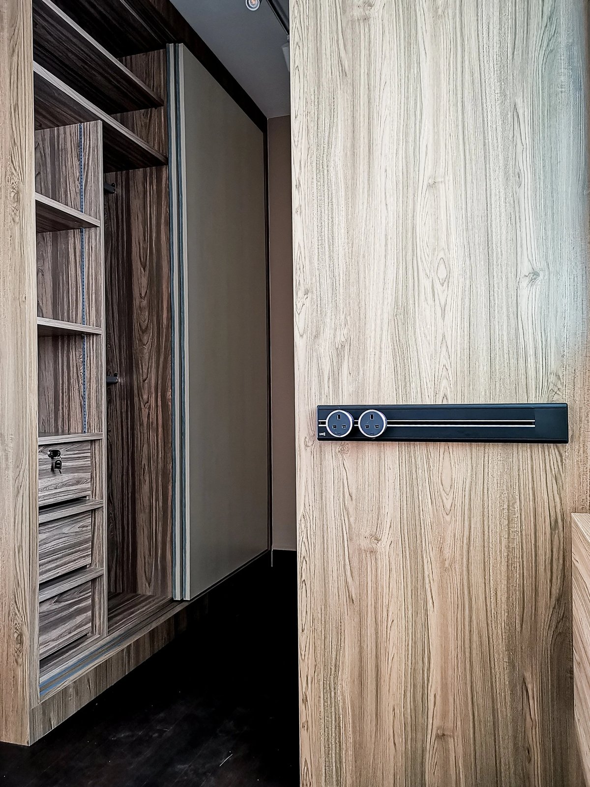 Line8 Model SL track in Black Hairline beside a wardrobe in a bedroom