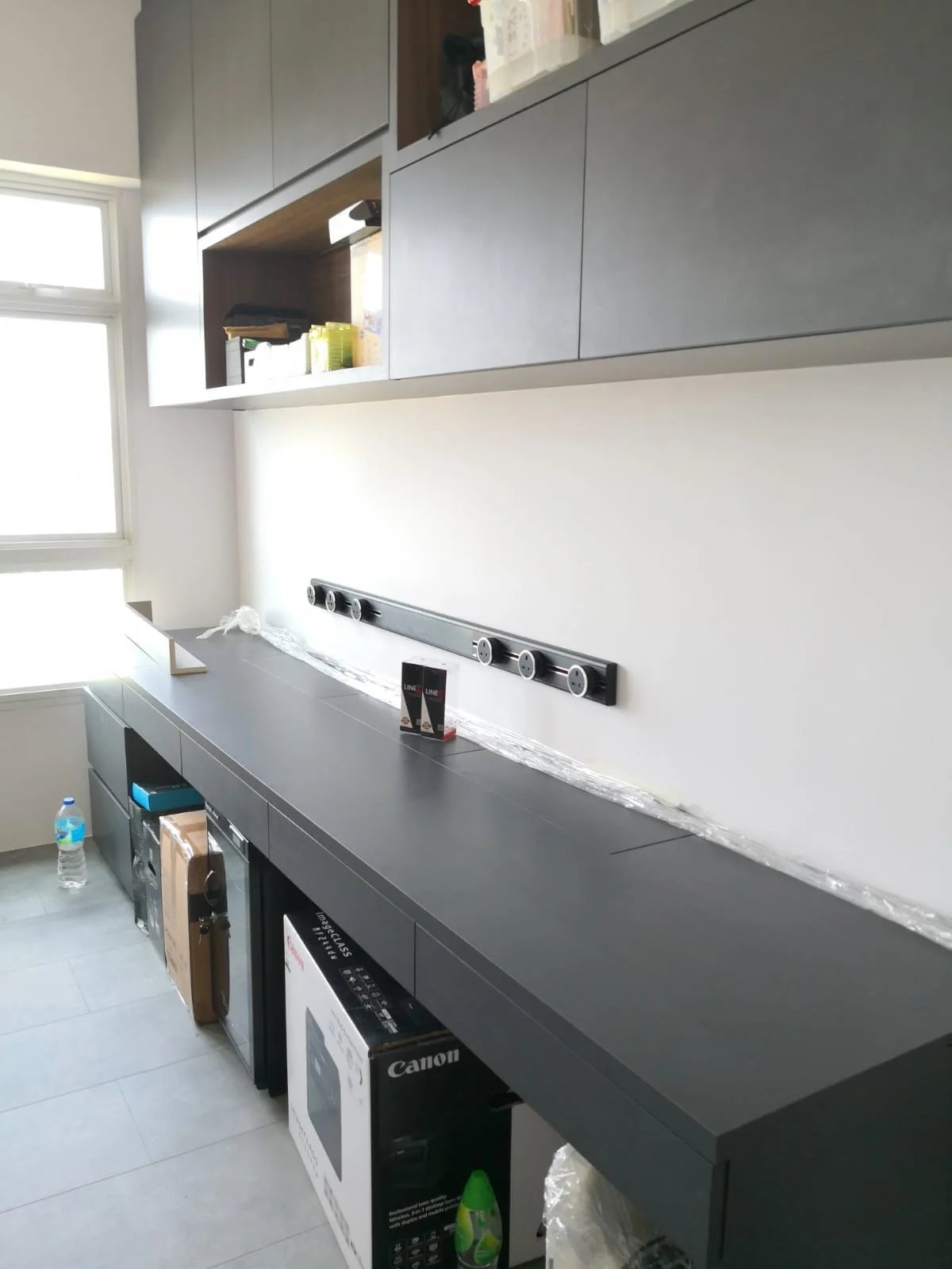 Line8 Model SL track in Black Hairline above a study desk