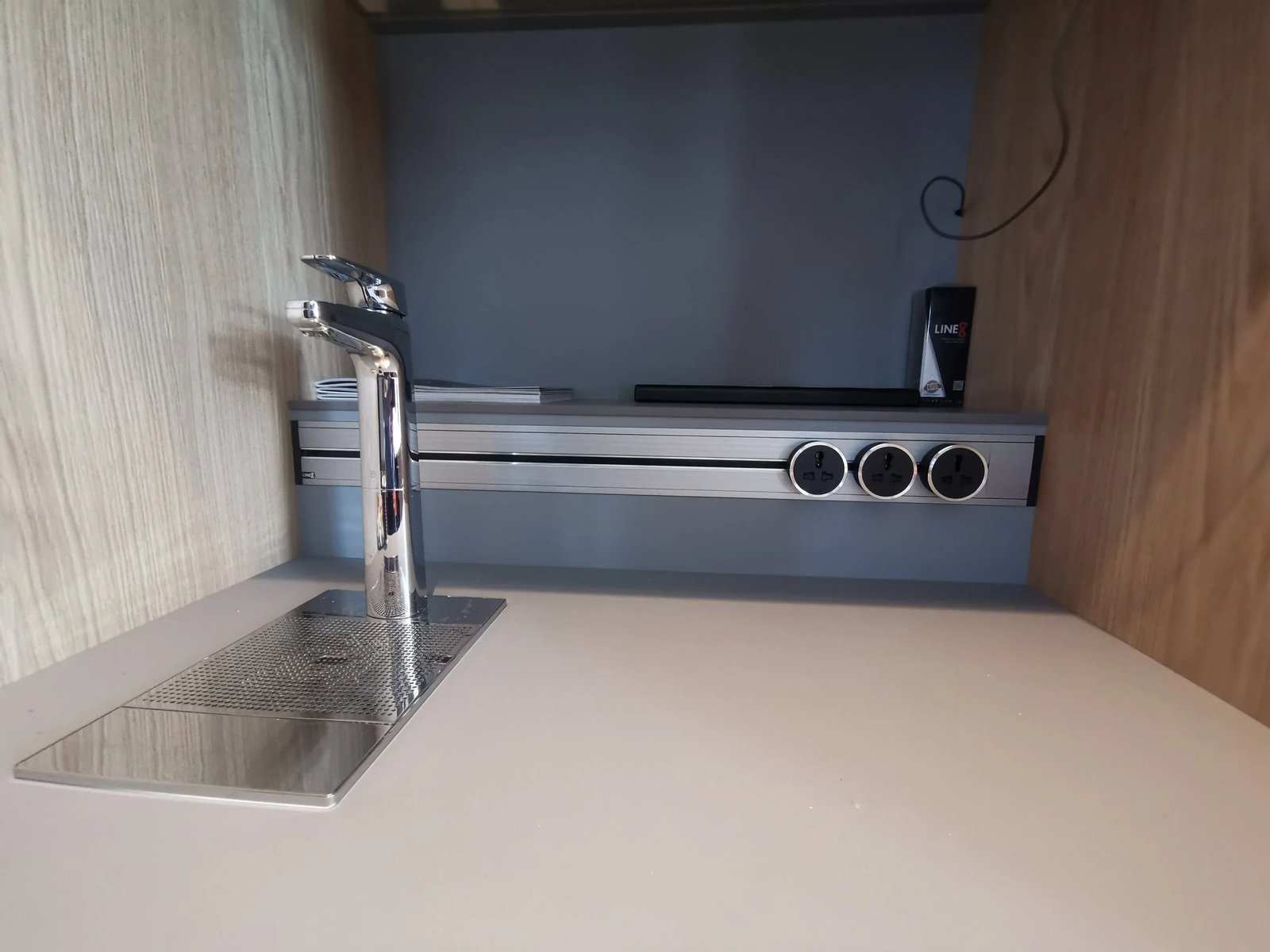 Line8 Model SL track in Silver Hairline above a kitchen sink
