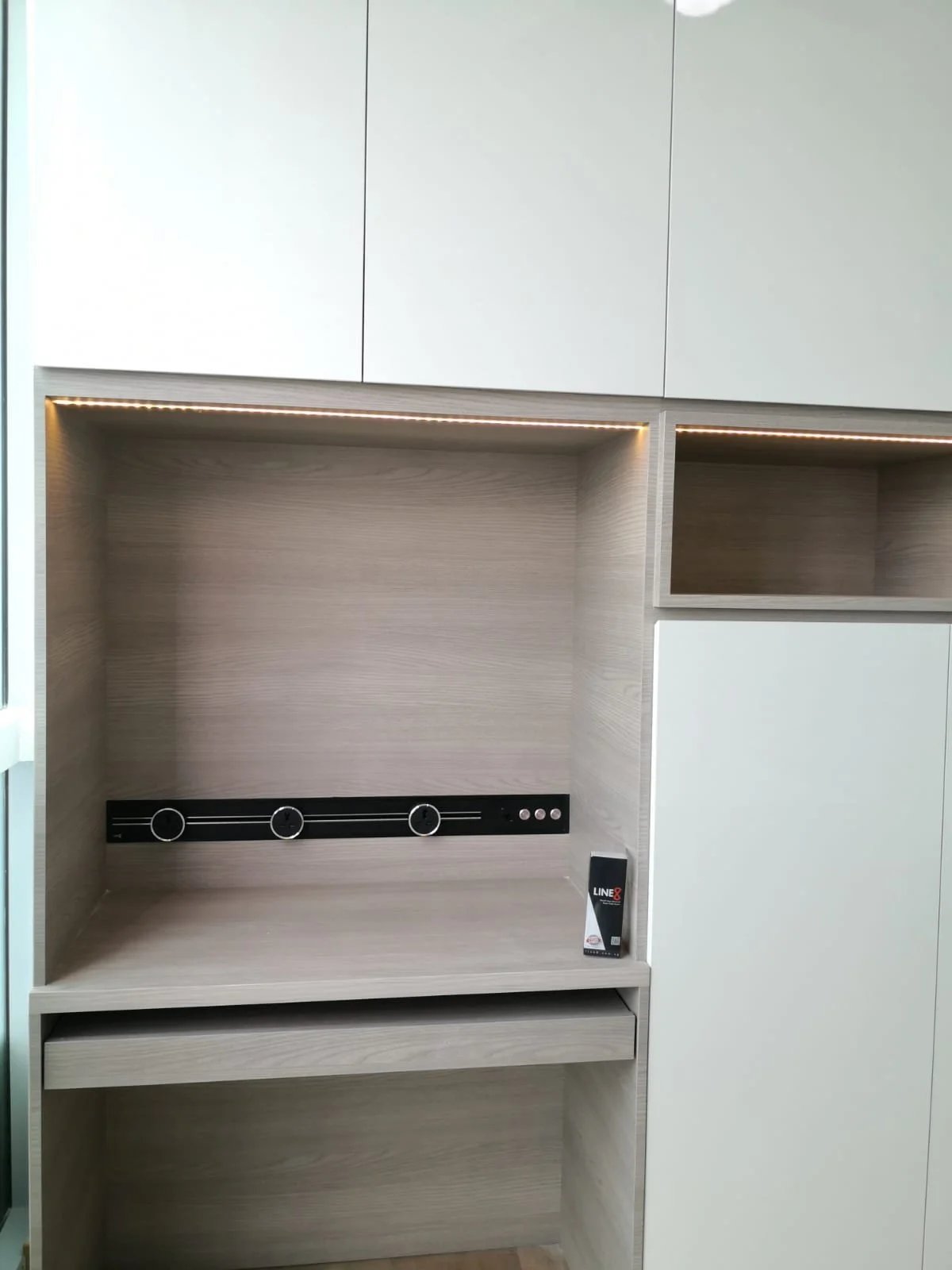 Line8 Model SL track in Black Hairline above a study desk powering lighting modules