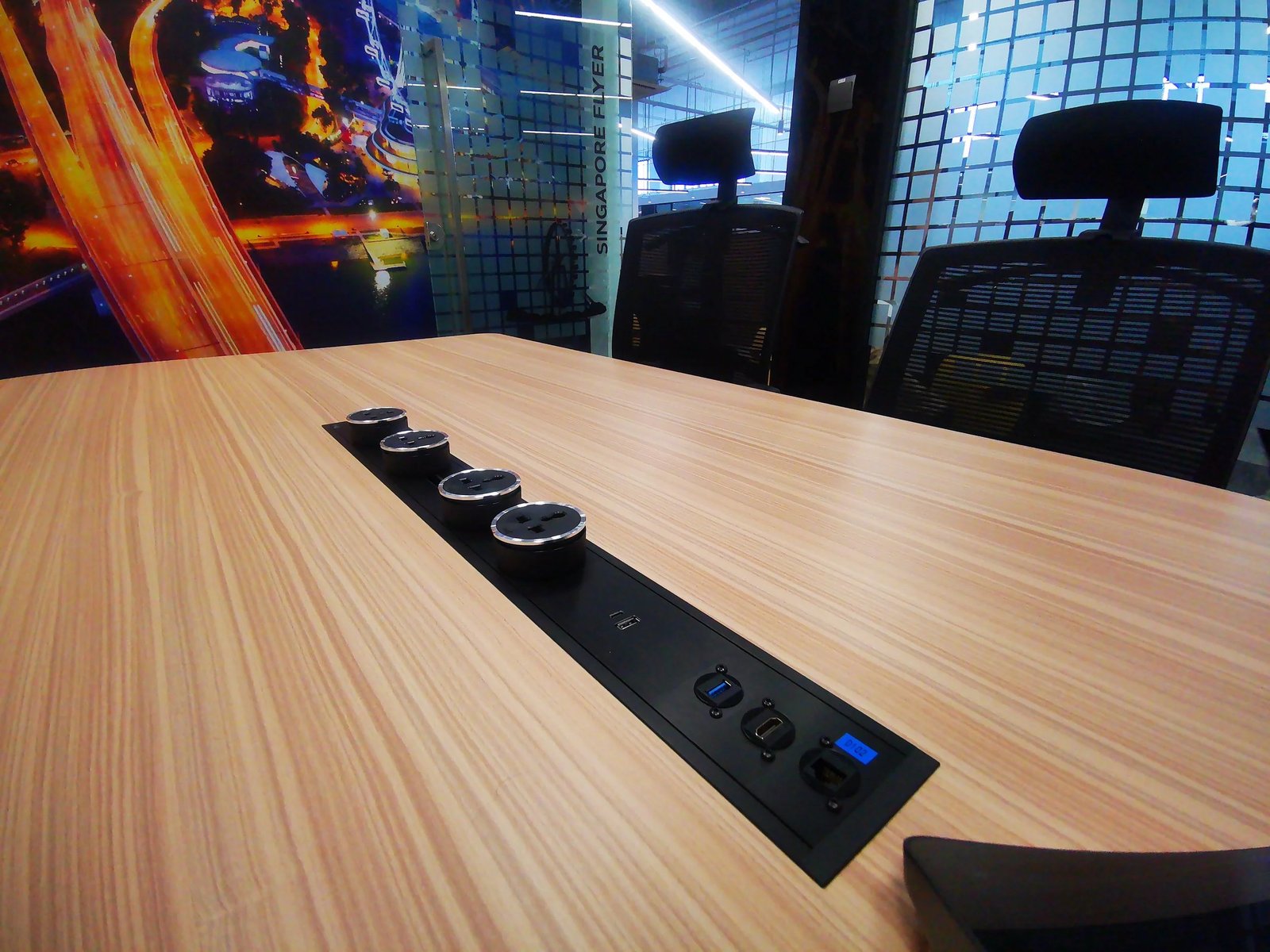 Line8 Model SL track in Black Hairline integrated into a conference table