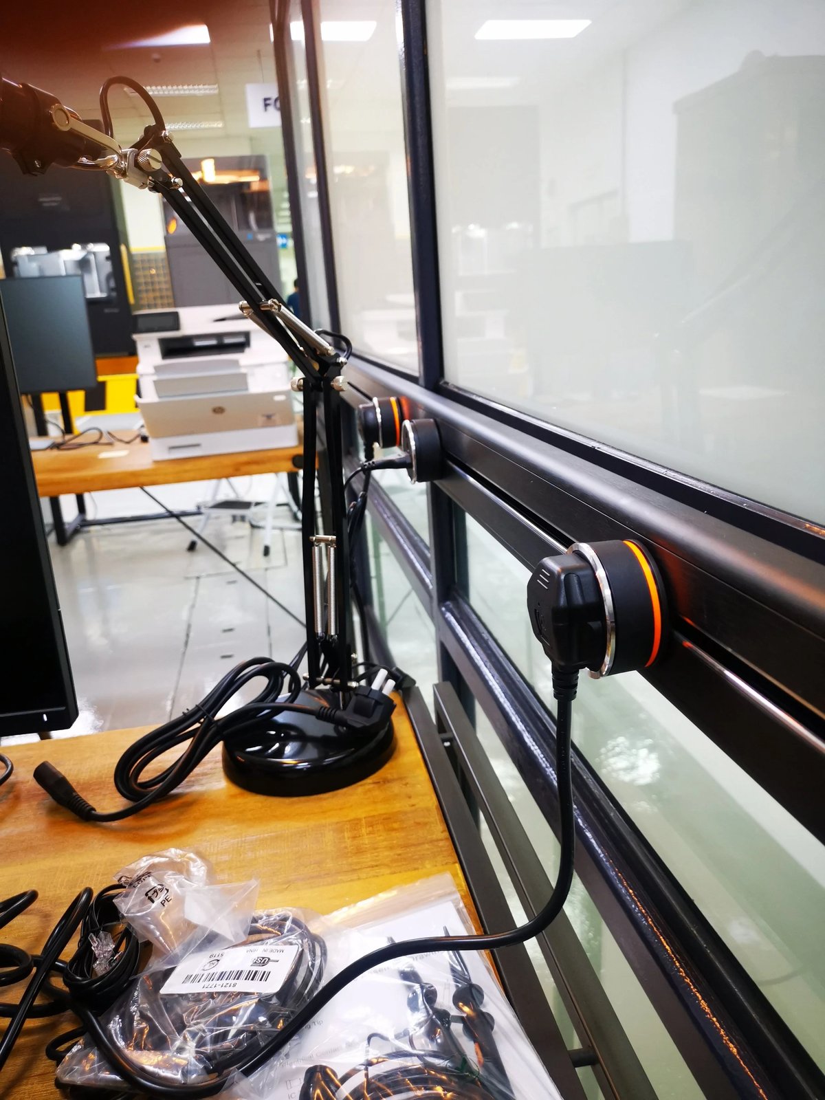 Line8 Model SL track in Black Hairline above a laboratory desk