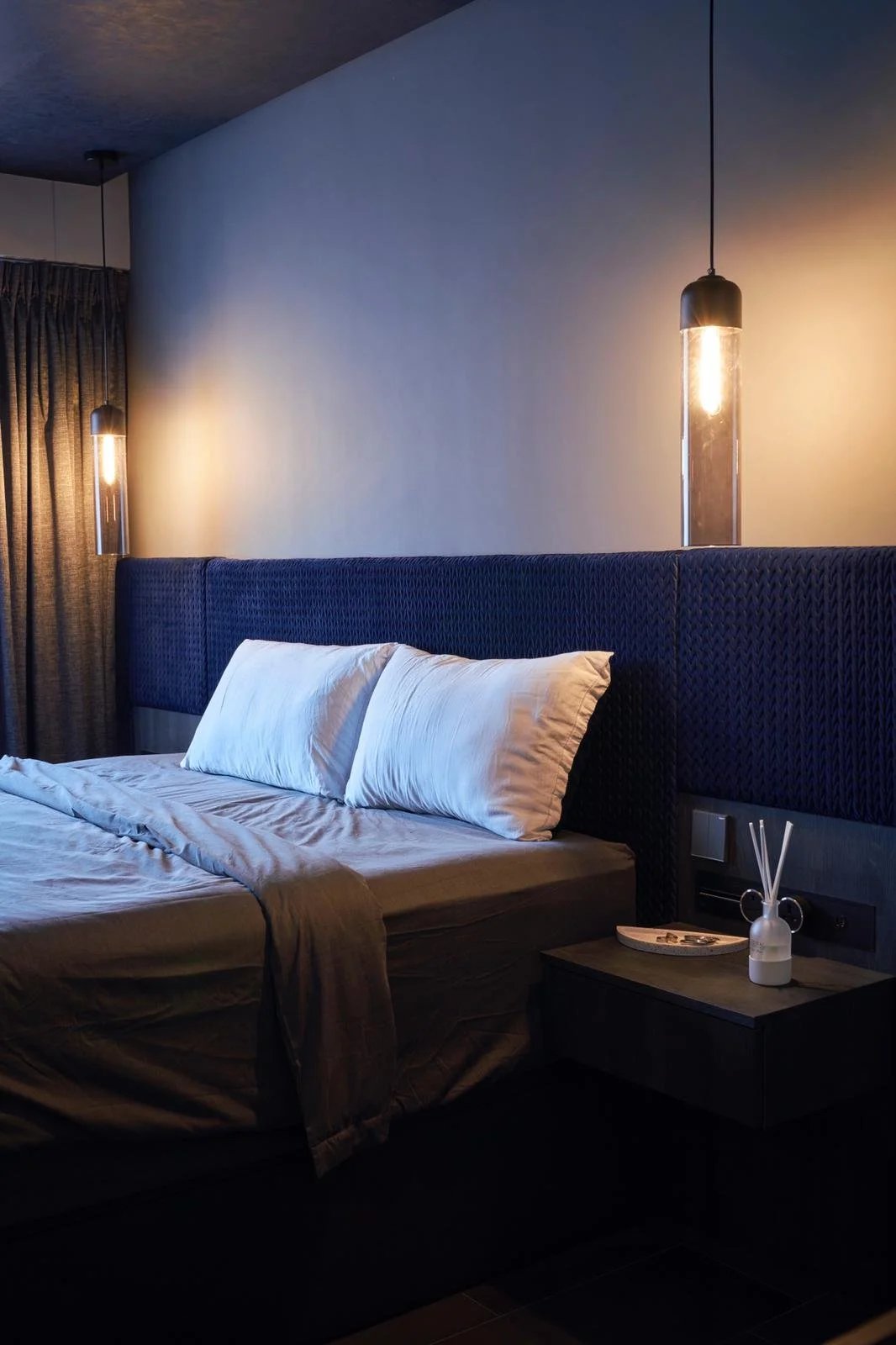 Line8 Model SL track in Black Hairline above a bedside table