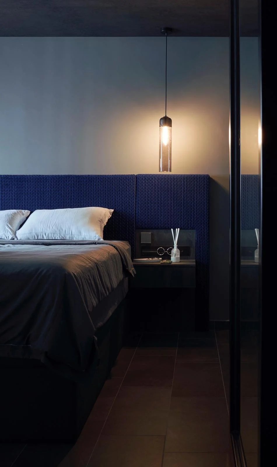 Line8 Model SL track in Black Hairline above the bedside table in a bedroom