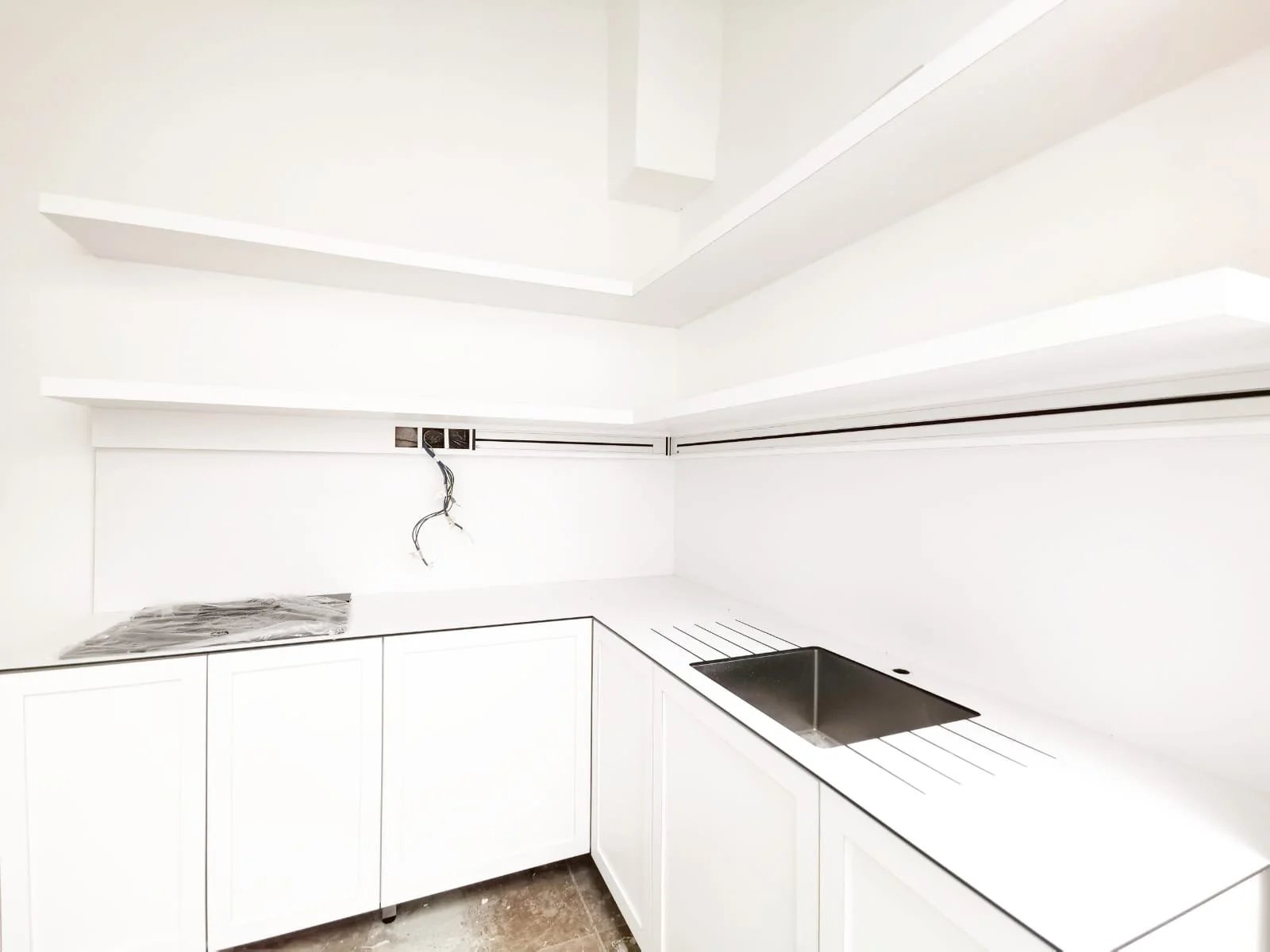 Line8 Model SL track in Black Hairline above the kitchen sink