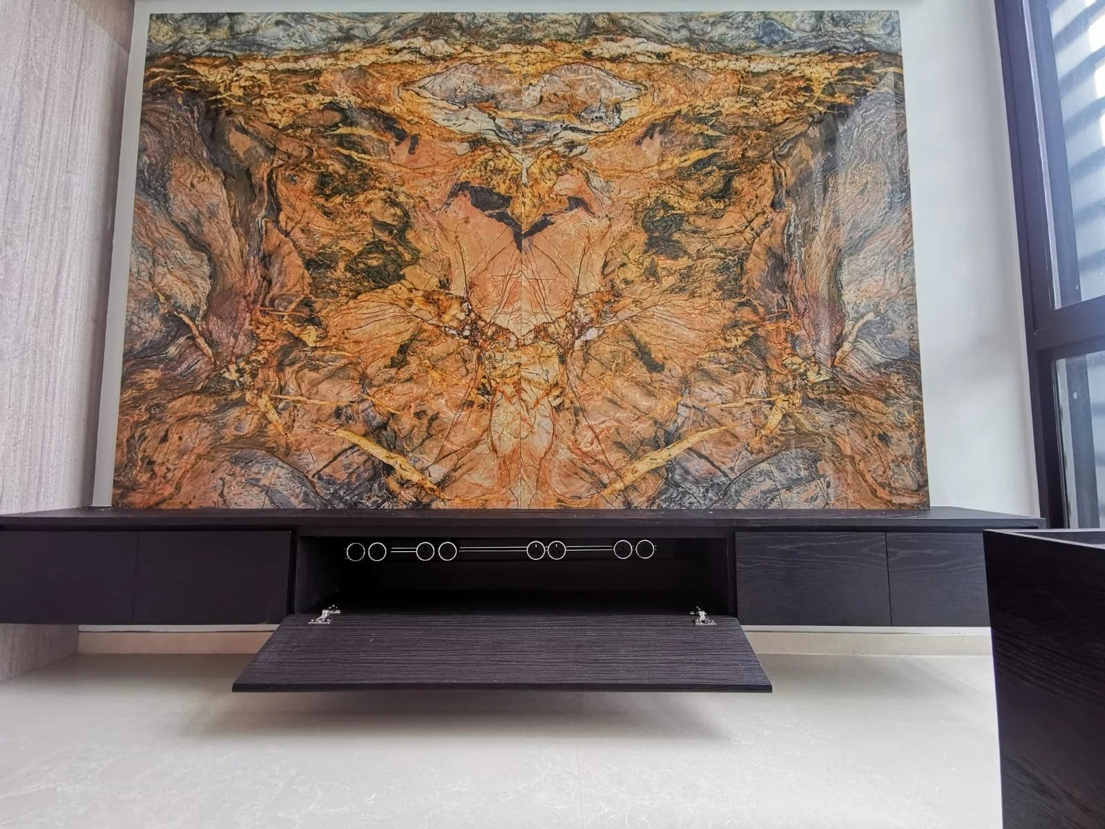 Line8 Model SL track in Black Hairline above a low cabinet with decorative wall art