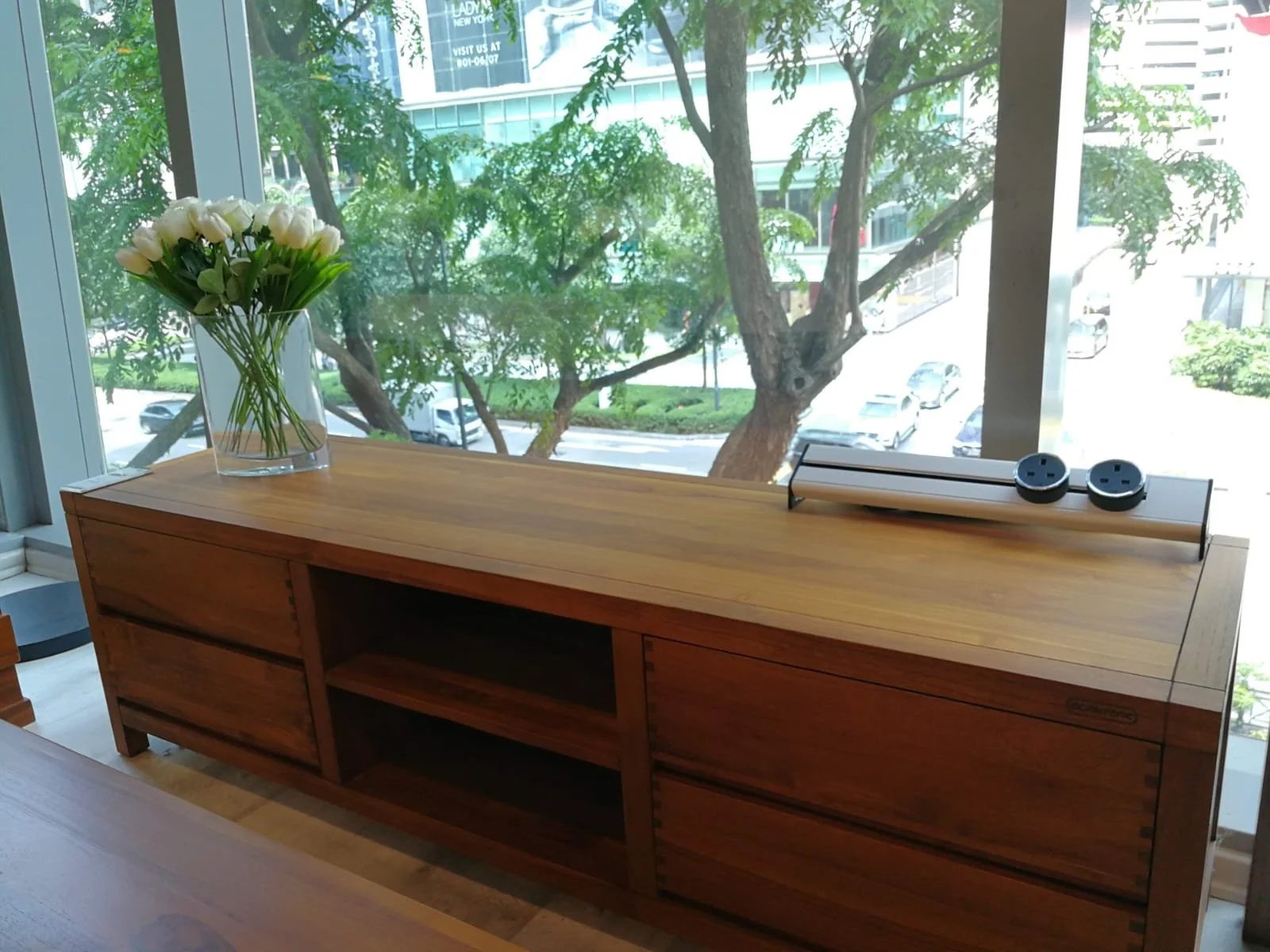 Line8 Model SL track in American Spruce above a wooden console table