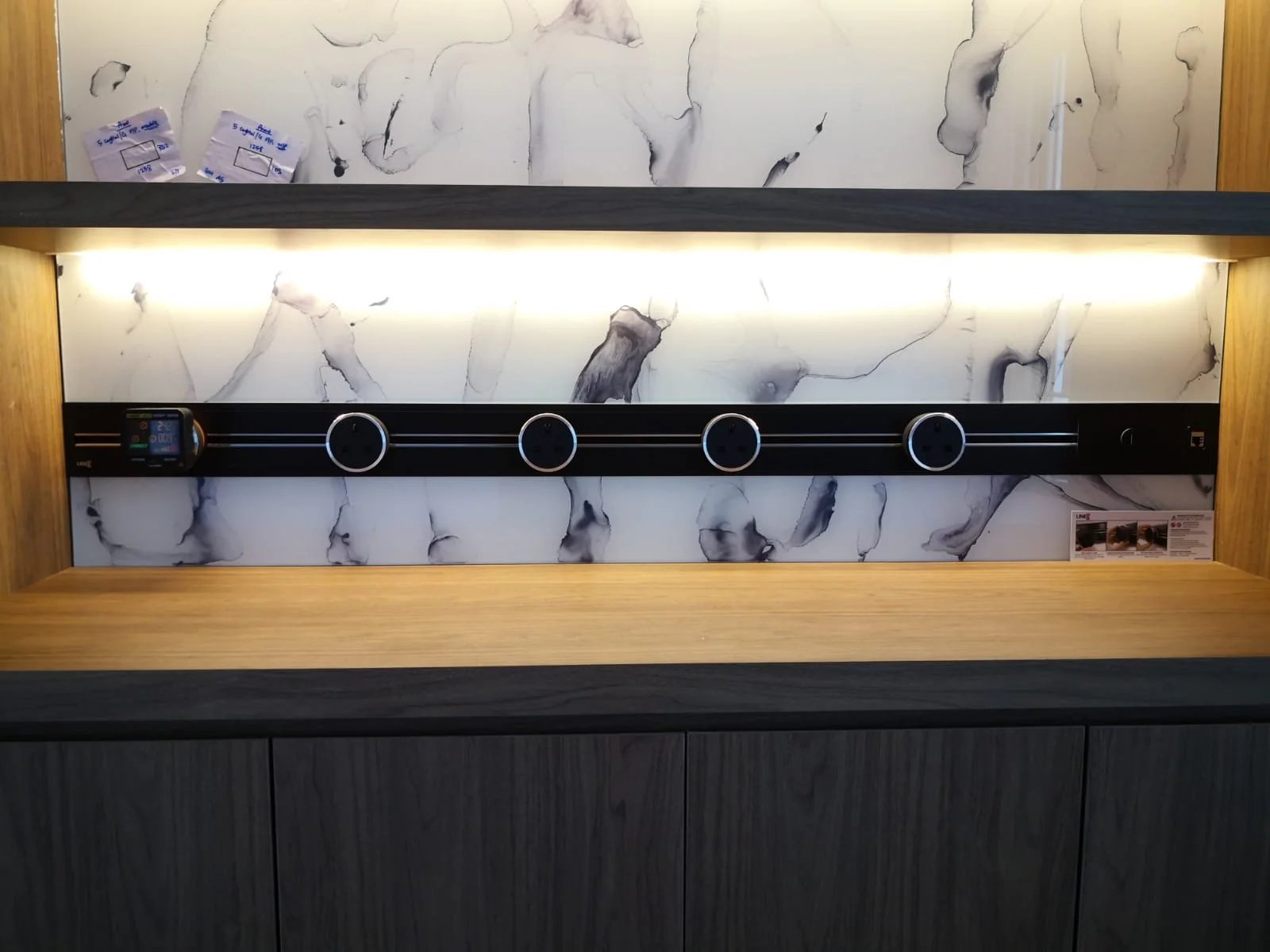 Line8 Model SL track in Black Hairline above a wooden shelf