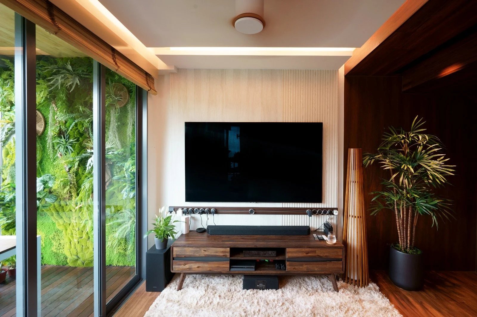 Line8 Model SL track in Black Hairline above a wooden media console