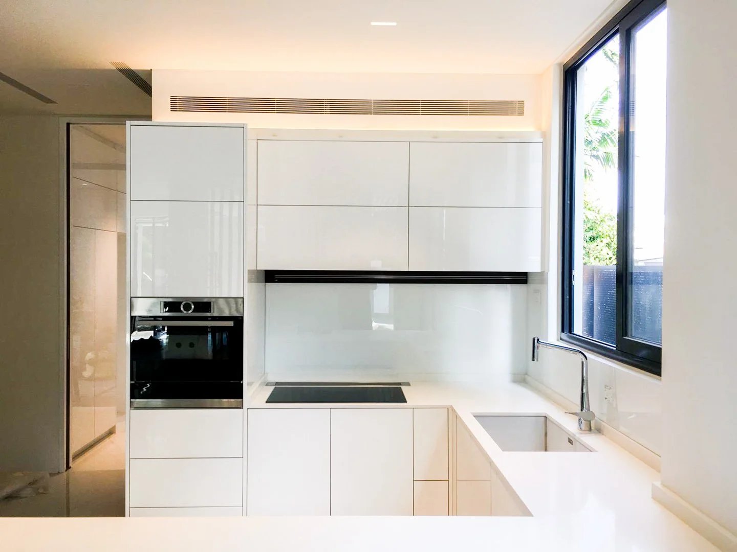 Line8 Model SL track in Black Hairline above a kitchen sink