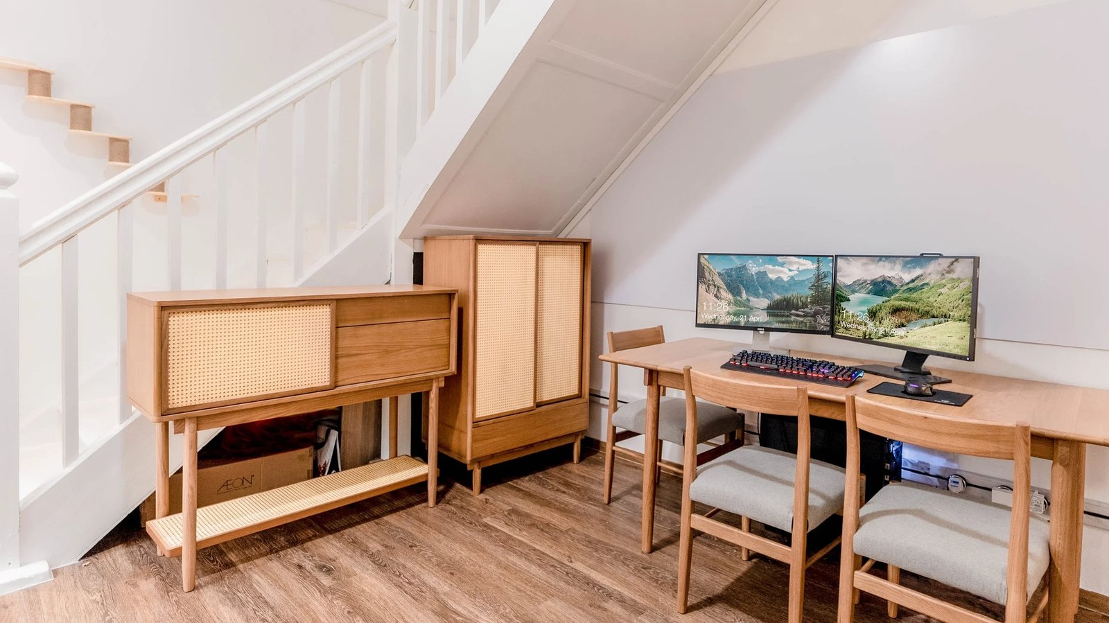 Line8 Model SL track in Black Hairline above a desk with dual monitors