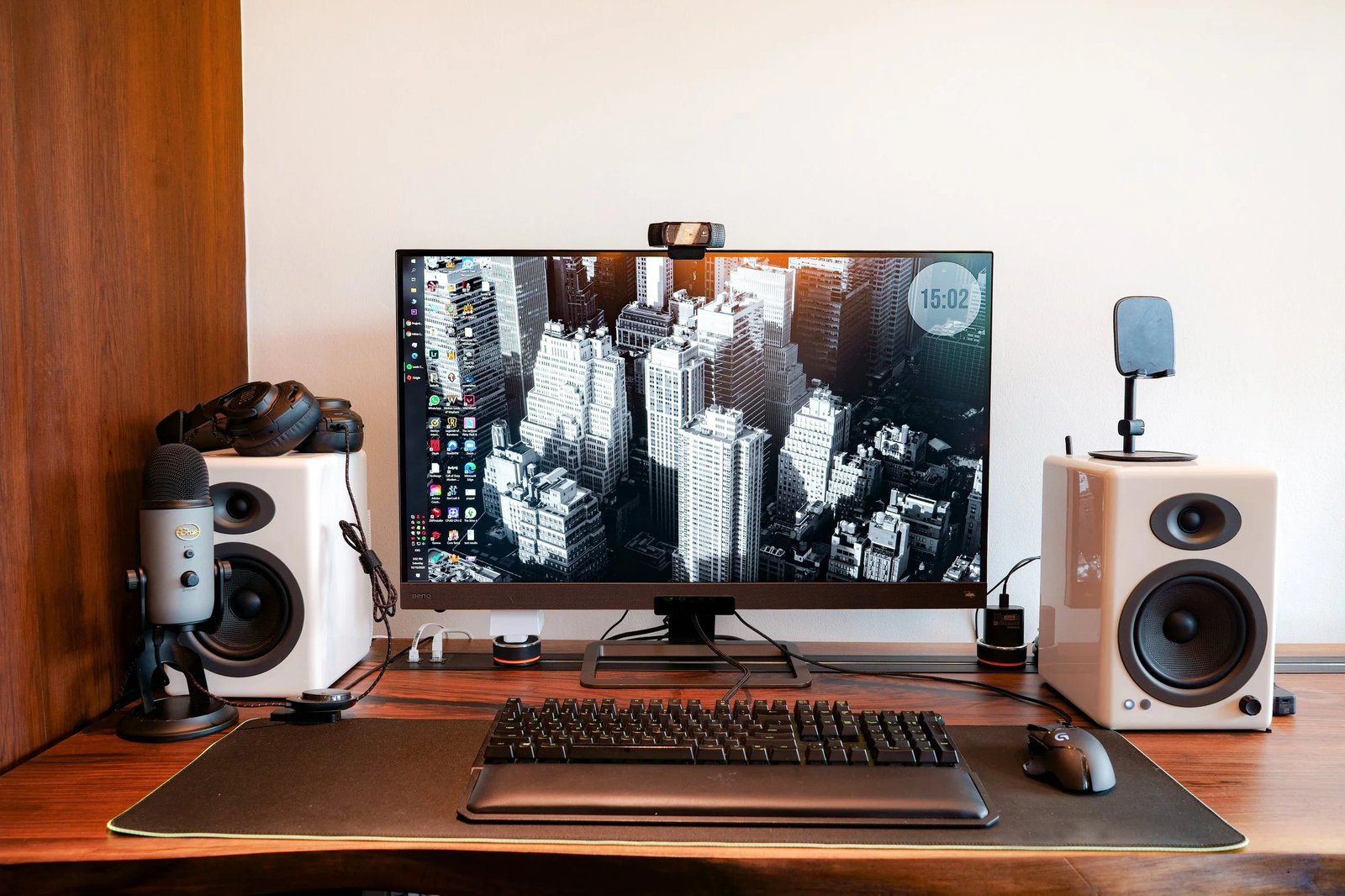 Line8 Model SL track in Black Hairline above a study desk powering a monitor and speakers