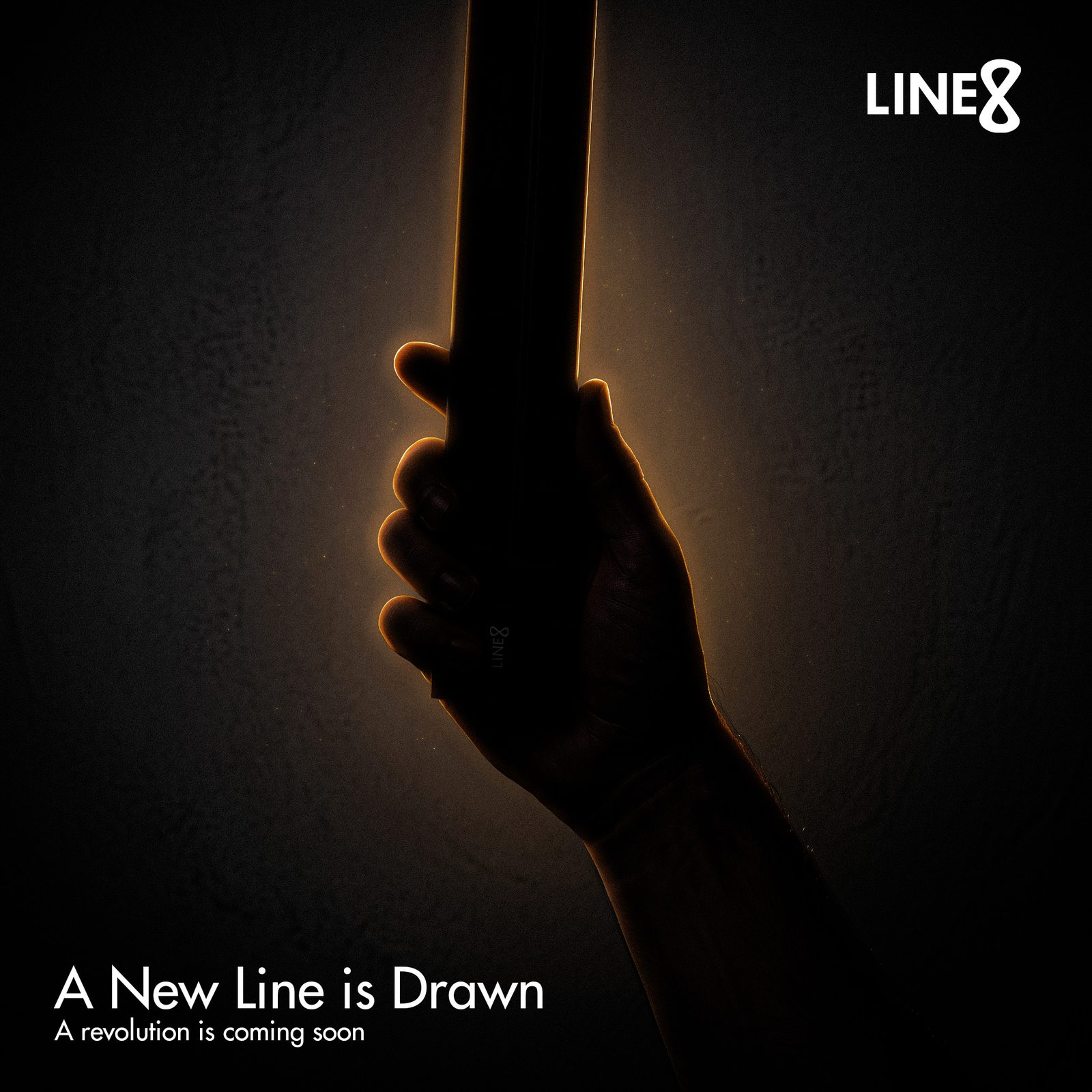 Hand holding the Line8 Zen Track power track, backlit in the dark. Caption reads: A New Line is Drawn — a revolution is coming soon.